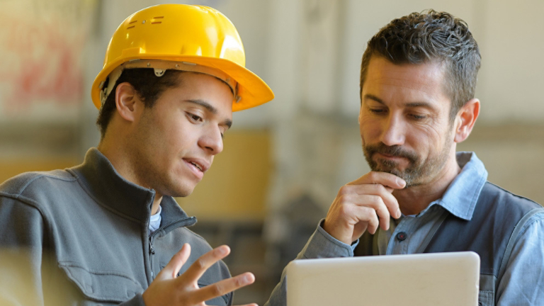 Technicians Learning on Tablet