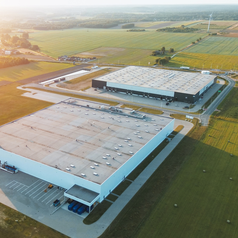 Distribution center surrounded by green fields