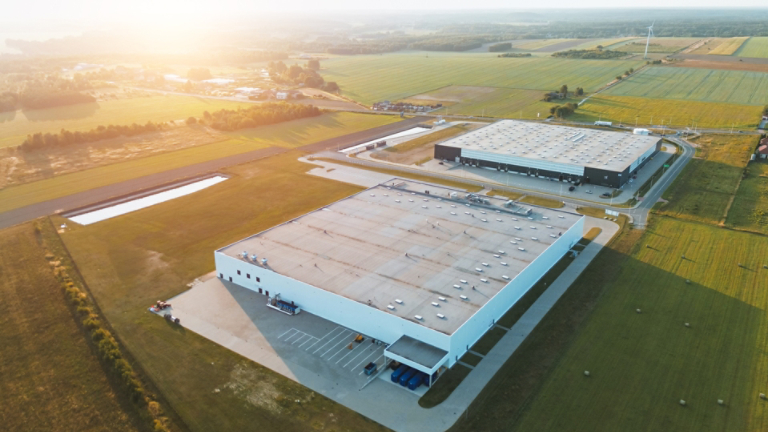 Distribution center surrounded by green fields