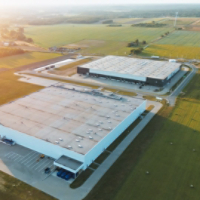 Distribution center surrounded by green fields