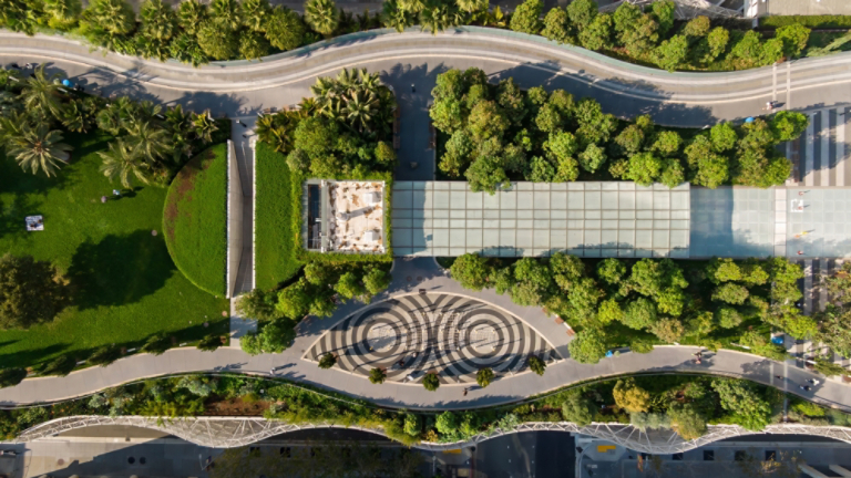 Aerial view of Salesforce Park in San Francisco, California, USA. People are walking and relaxing in the park, enjoying the green space and urban oasis.