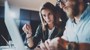 two people looking at screen