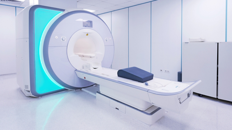 Female patient undergoing MRI - Magnetic resonance imaging scan device in Hospital. Medical Equipment and Health Care..