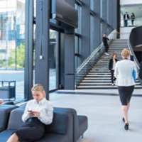 Business people at hall of office building