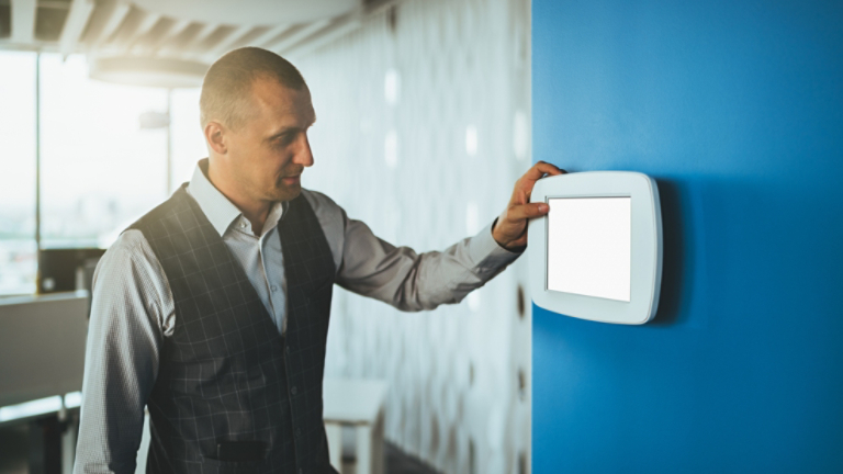 Businessman using electronic panel