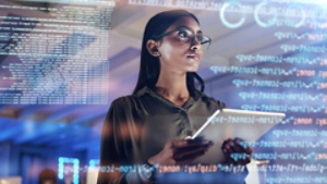 Software, coding hologram and woman on tablet thinking of data analytics, digital technology and night overlay. Programmer or IT person in glasses on 3d screen, programming and cybersecurity research