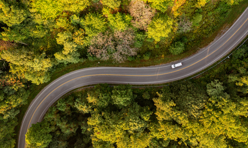 Car driving on rural road