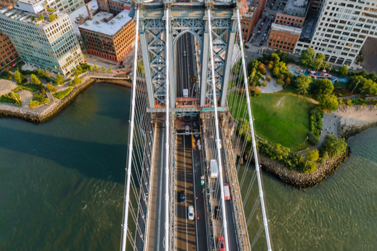 Manhattan bridge with city coastline