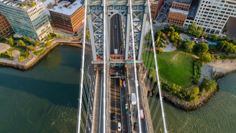 Manhattan bridge with city coastline