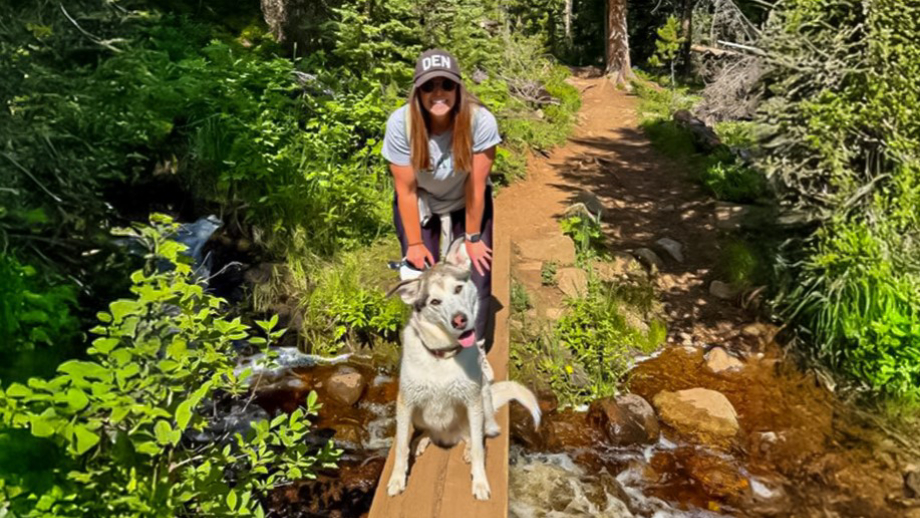 Emily hiking with her dog