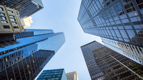 view looking up at financial district buildings