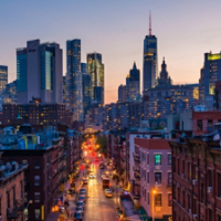 View of Madison Street and Lower Manhattan at sunset from the Manhattan Bridge in New York City