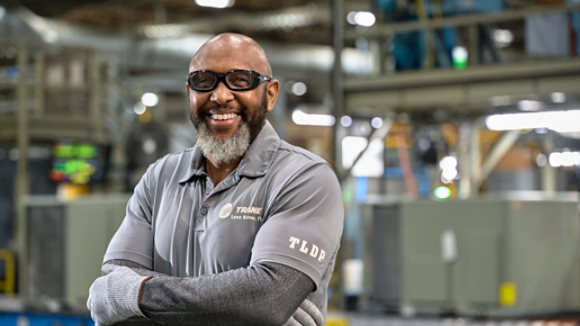 Male manufacturing employee smiling 4 