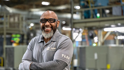 Male manufacturing employee smiling 4 
