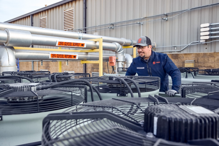 Technician inspecting units 2