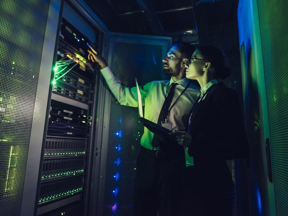 Man and woman in data centre