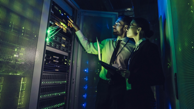 Man and woman in data centre