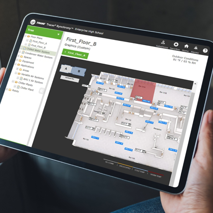 Mockup image of a woman holding black tablet pc with blank white screen in cafe