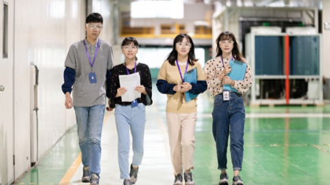Group of engineers walking in ETC plant