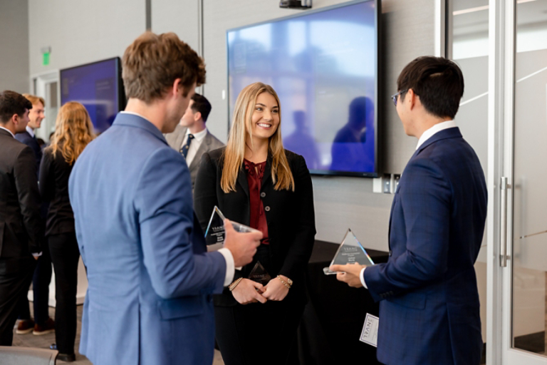 ADP graduates chatting