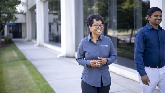 Davidson employees talking while leaving building 