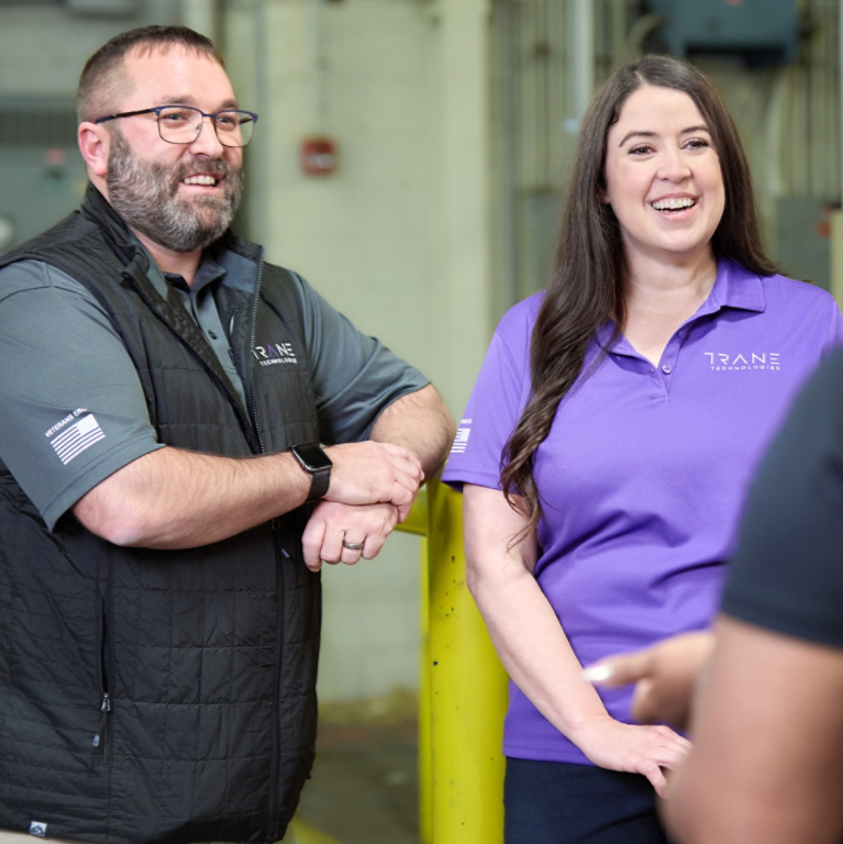 Employees talking in mechanical room