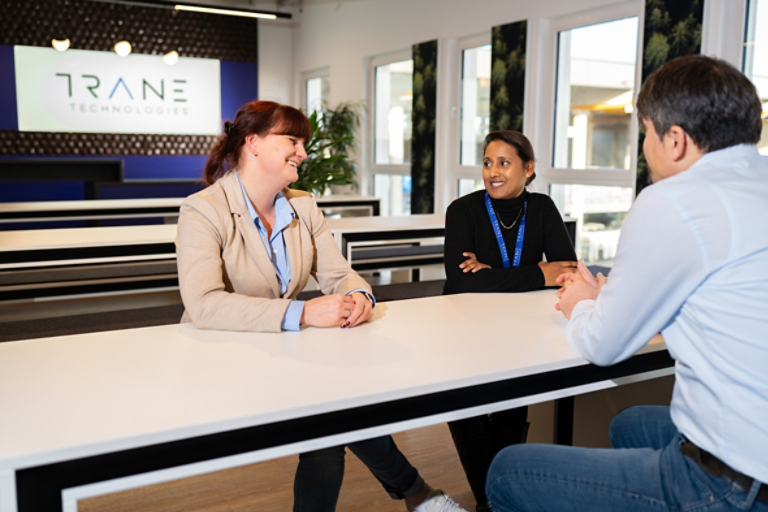 Employees in bright office