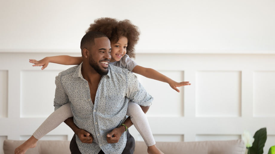 Father daughter piggyback ride