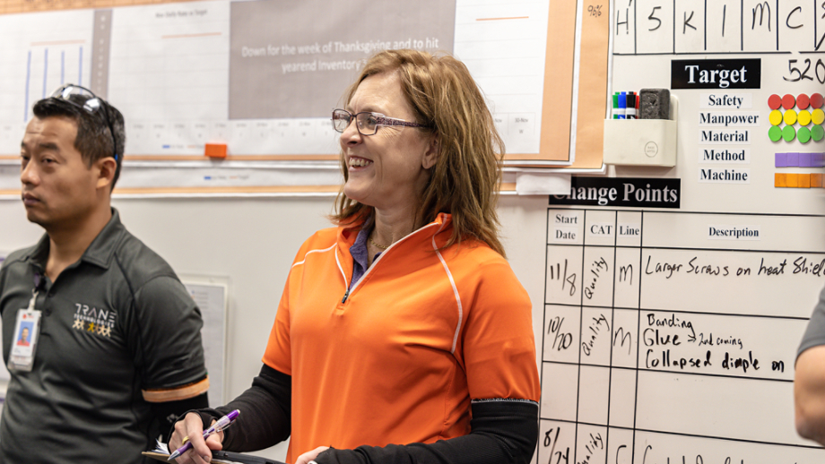 Female employee smiling in meeting