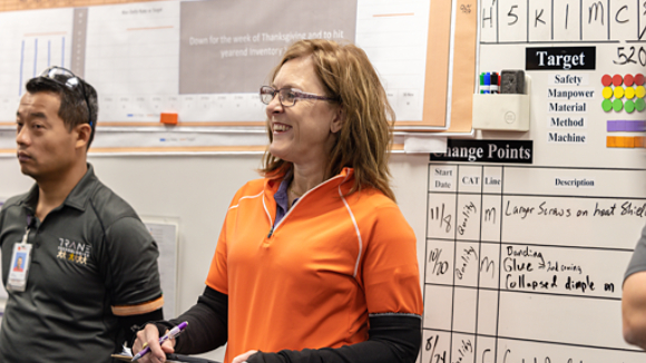 Female employee smiling in meeting