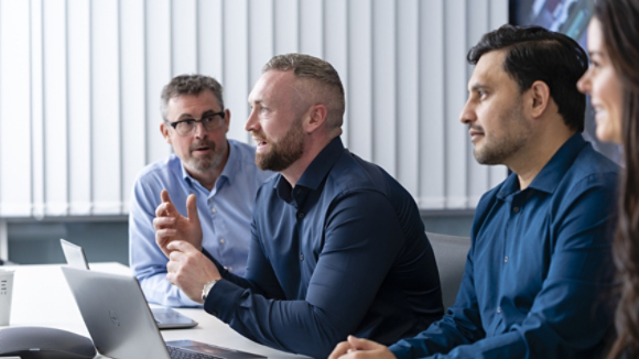 Swords employees collaborating