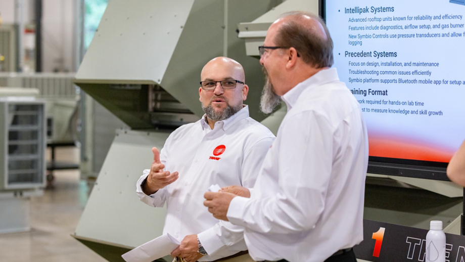 Technicians presenting in training center