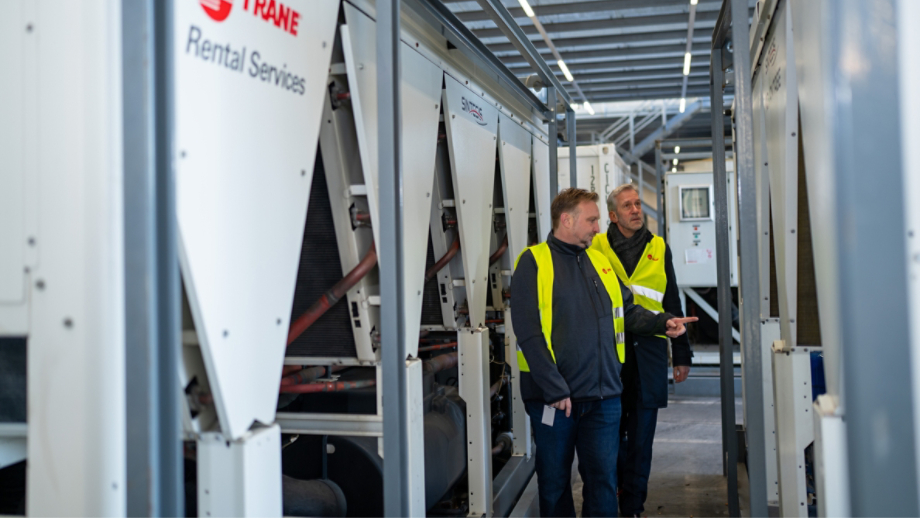 Techs inspecting chiller