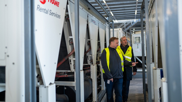 Techs inspecting chiller
