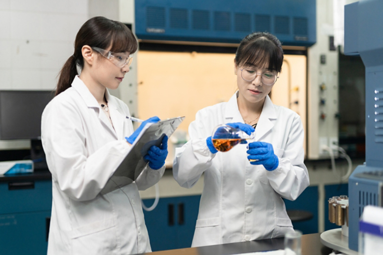 ETC female lab engineers actively working 2