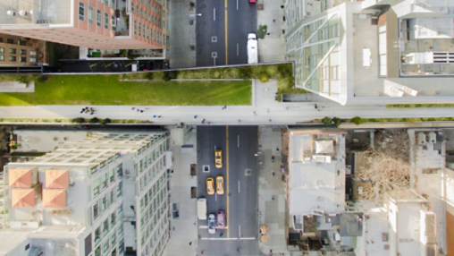 City buildings near Green Grass