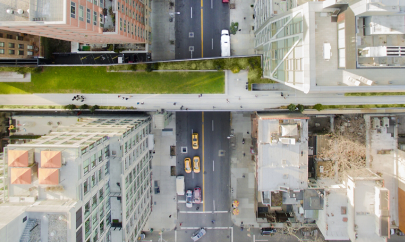 City buildings near Green Grass