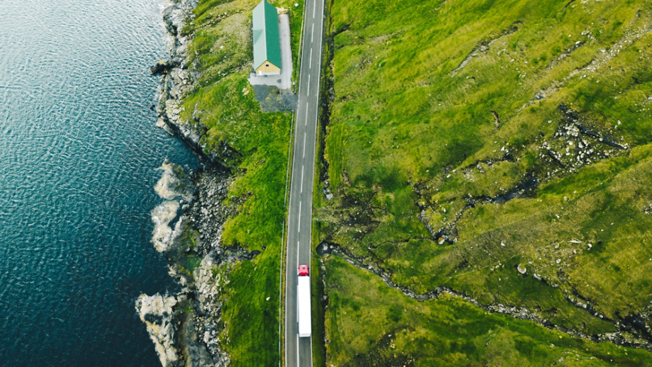 Truck with Trailer on green hillside