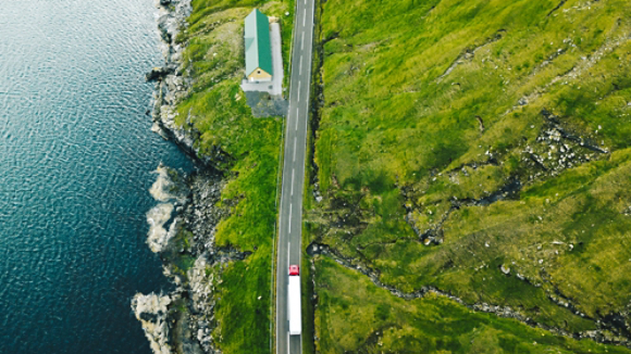 Truck with Trailer on green hillside