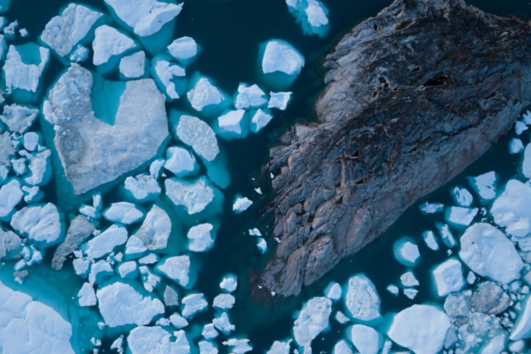 White Ice on dark blue water