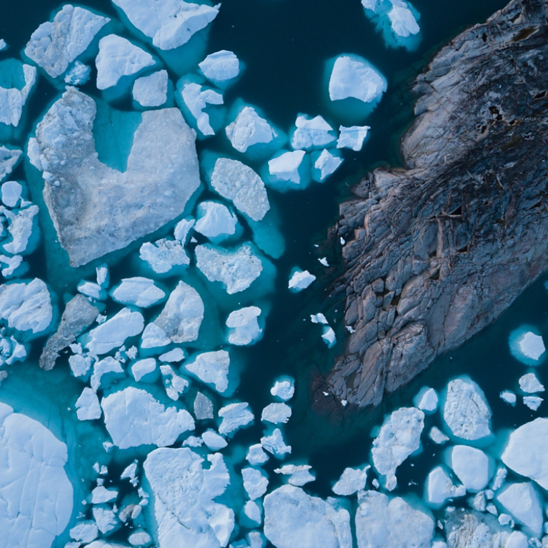 White Ice on dark blue water