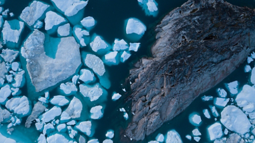 White Ice on dark blue water