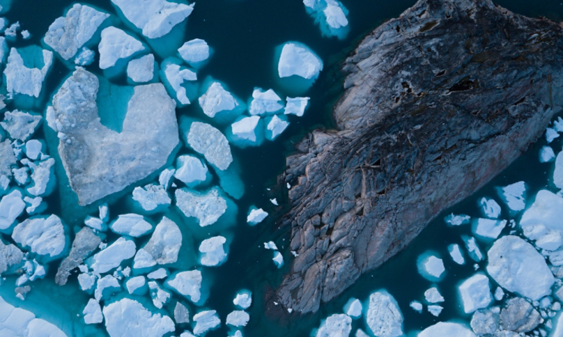 White Ice on dark blue water