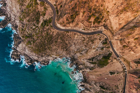 Mountainside with ocean and road