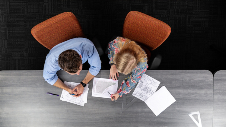 Overhead view of a work discussion