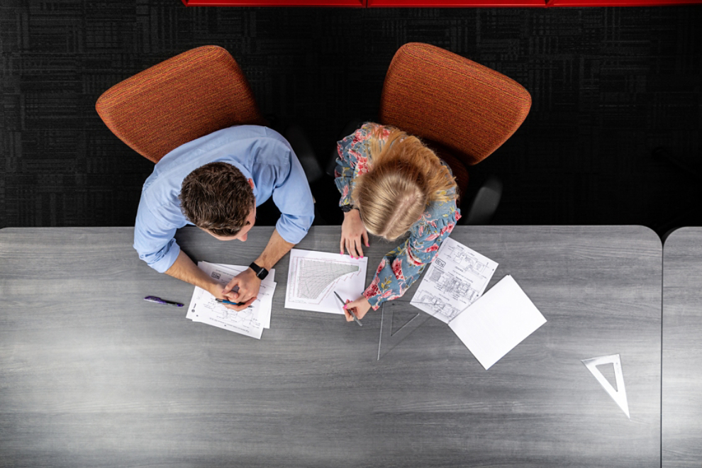 Overhead view of a work discussion