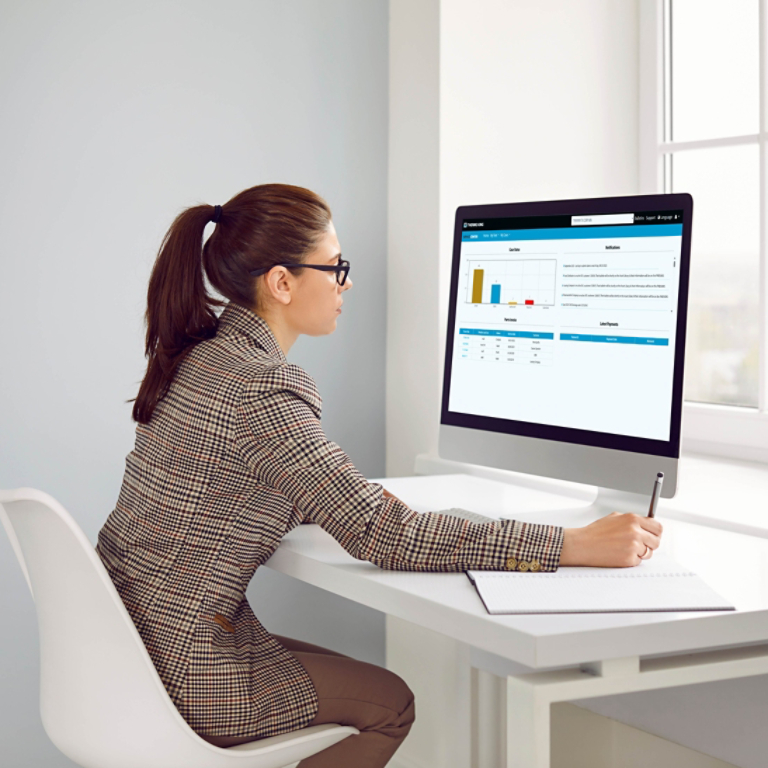 Women analzying centralized billing dashboard