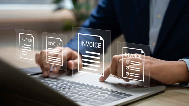 Man working on Invoice Management