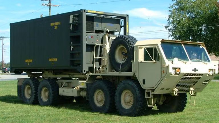 Side view of Klinge refrigerated A-frame military shipping container