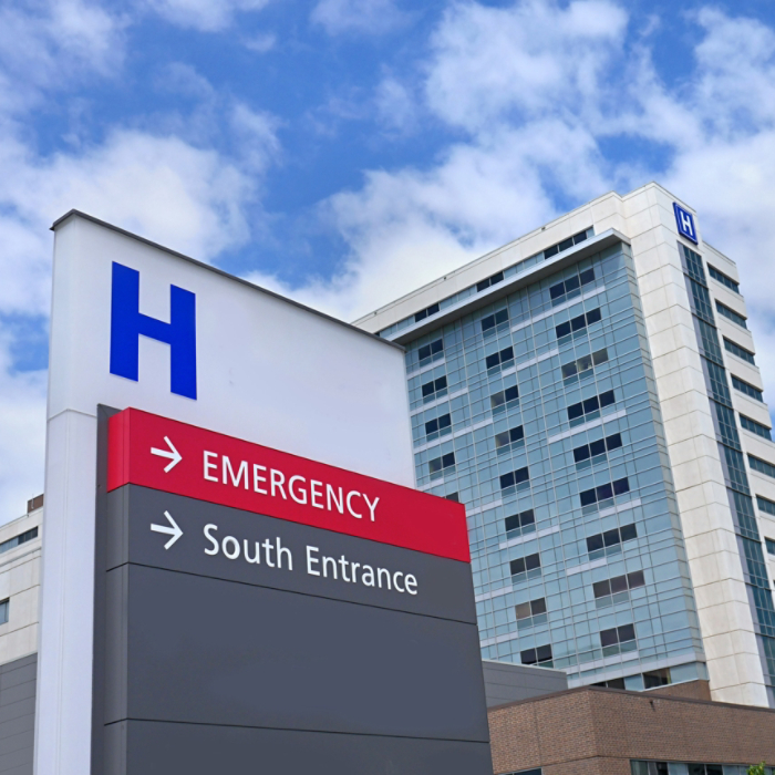 direction sign with capital letter H for hospital